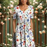 Agnes™- Elegant blomsterkjole med magevennlig passform