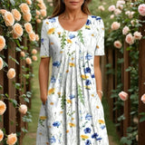 Agnes™- Elegant blomsterkjole med magevennlig passform