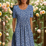 Agnes™- Elegant blomsterkjole med magevennlig passform